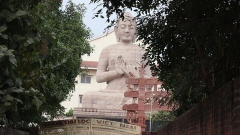 Varanasi,Uttar Pradesh,India - October 20 2020: Beautiful view of the new stupa of Lord Buddha with selective focus in the Sarnath area of Varanasi. New architecture of Buddha statue with copyspace.