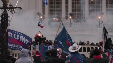 Washington DC, District of Columbia, USA - January 6 2021: mob of Trump supporters breaches Capitol Building during insurrection 