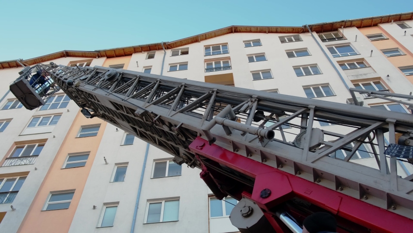 A ladder used by firefighters in a fire truck during a fire. 