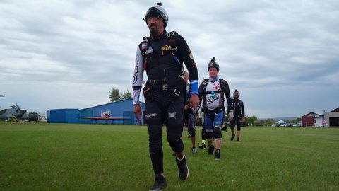 Russia. Tanay 18-23 August 2020: World Parachuting Championships Mondial: Men Parachute with Resolute Look Go to Airplane. Gonna Rise Into Air. Skydiving. Dangerous Sport. Brave People. Parachuting