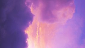 Colorful cloudscape changing in vertical time lapse video in 4k
