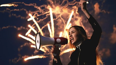Anger female feminist demonstration shout loudspeaker. Gender rights feminism fighting. Person. War aggressive girl shouting megaphone. Empowerment striking out action angry woman. Explosion firework.