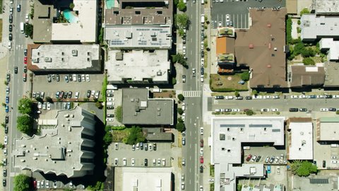 Aerial view overhead of Oakland California painted slogan Black Lives Matter after death of George Floyd quiet streets shops closed due to Coronavirus pandemic