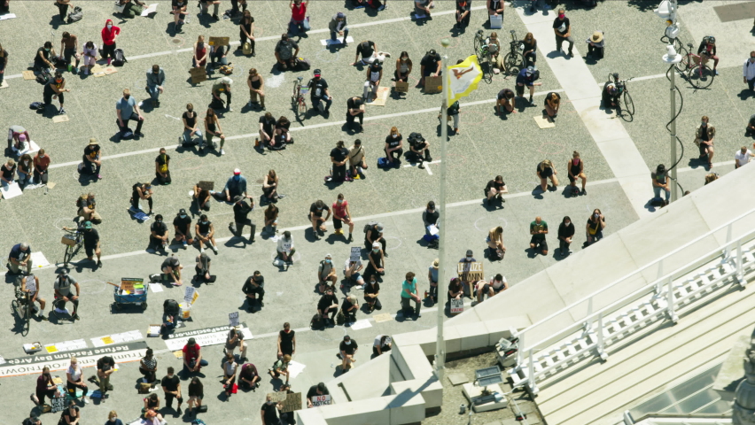 Aerial people taking the knee City Hall San Francisco during Covid19 pandemic Black Lives Matter protesters practicing social distancing while demonstrating California America
