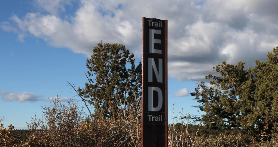 A sign marks the end of the trail on the top of Bear Mountain in Sedona, Arizona, USA.
