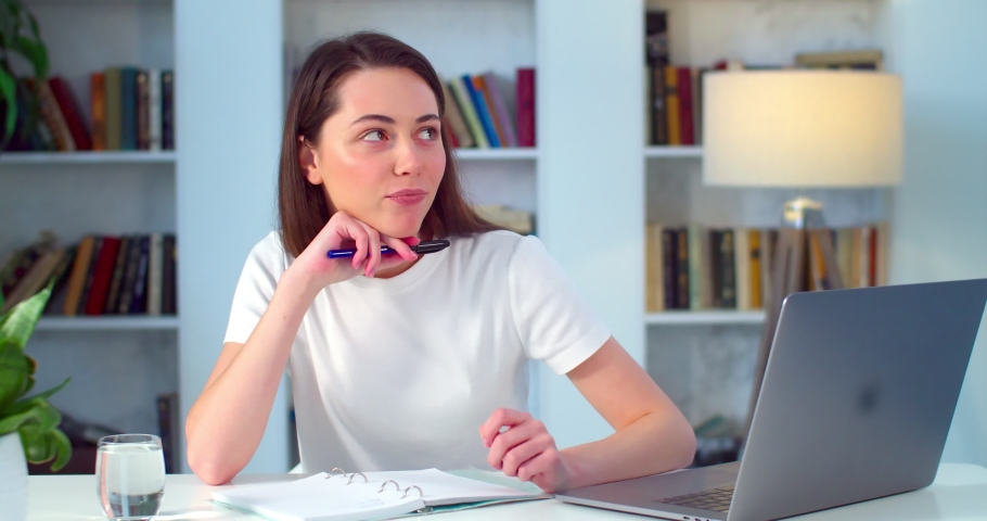 Caucasian young woman virtual teacher consulting patient teaching student looking talking to camera make conference call recording video training sit on sofa at home office, webcam view Royalty-Free Stock Footage #1065383404