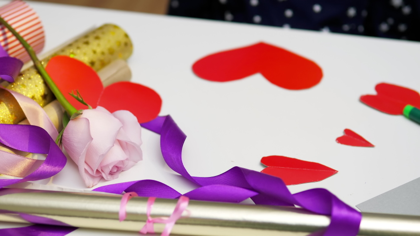 Red valentine heart with little girl hands. Declaration of love. Congratulations on Valentine