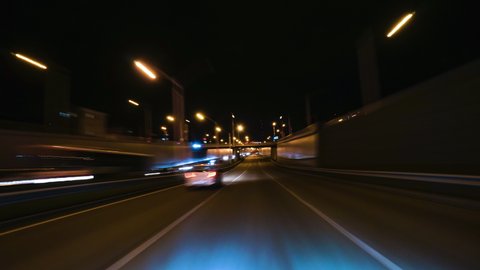The Car Driving On The Night City Road Hyperlapse. Trip Travel Concept. Freedom on the Road Sort of Dashcam POV High Speed