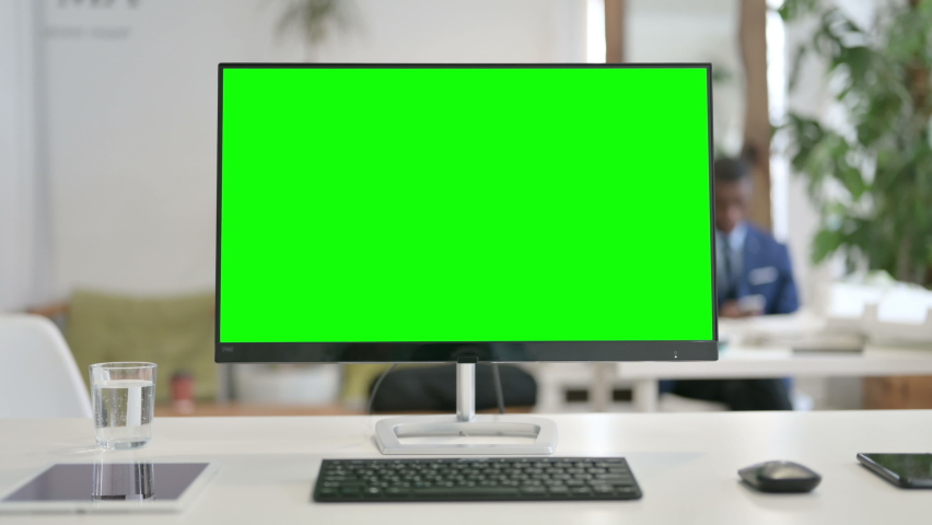 Desktop with Green Chroma Key Screen, Zoom In  | Shutterstock HD Video #1065433264