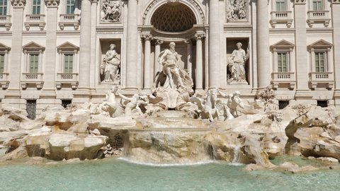 Trevi Fountain (Fontana di Trevi) in Rome, Italy, Baroque style city landmark from 1762, zoom out in 4k