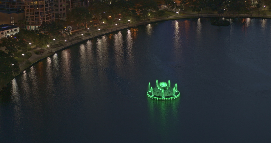 Orlando Florida Aerial v33 birdseye tilt up shot of fountain on Lake Eola and downtown cityscape at dusk night - Inspire 2, X7, 6k - March 2020