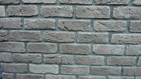 Decorative stone wall. Distinctive colorful style. Home and office design backdrop. Old grunge brick wall background.