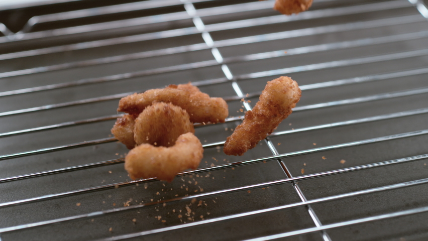 Fried shrimp falling in slow motion. Shot with Phantom Flex 4K camera.