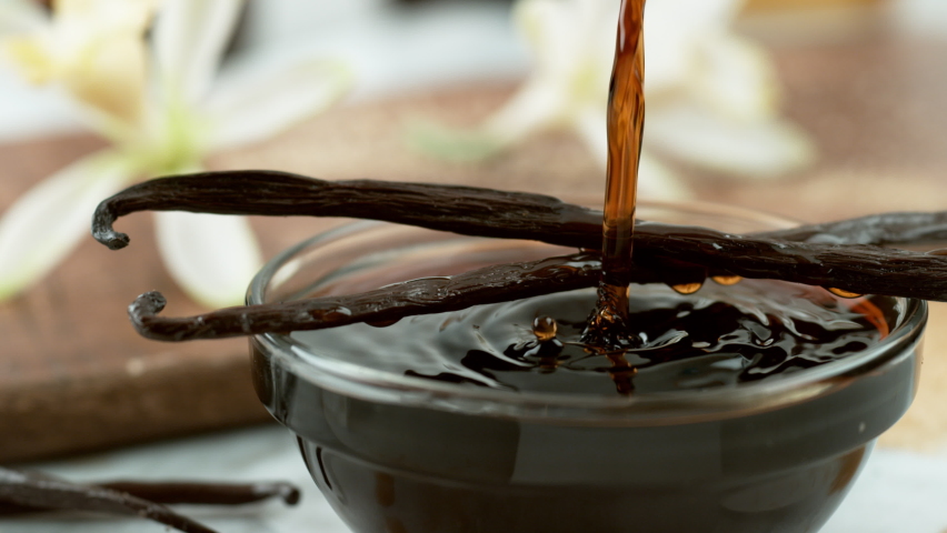 Vanilla extract pouring into small bowl, slow motion. Shot on Phantom Flex 4K camera.