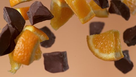 Chunks of chocolate and oranges flying in slow motion. Shot with Phantom Flex 4K camera.