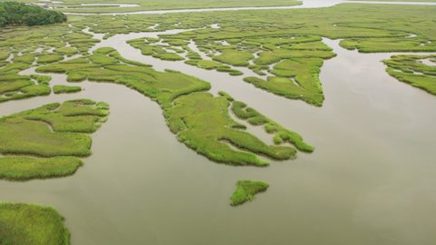 Georgia circa-2019. Aerial view of abstract patterns of wetlands in Georgia. Shot from helicopter with Cineflex gimbal and RED 8K camera.