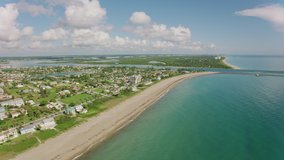 Florida circa-2019. Aerial view of Florida beach and Atlantic Ocean. Shot from helicopter with Cineflex gimbal and RED 8K camera.