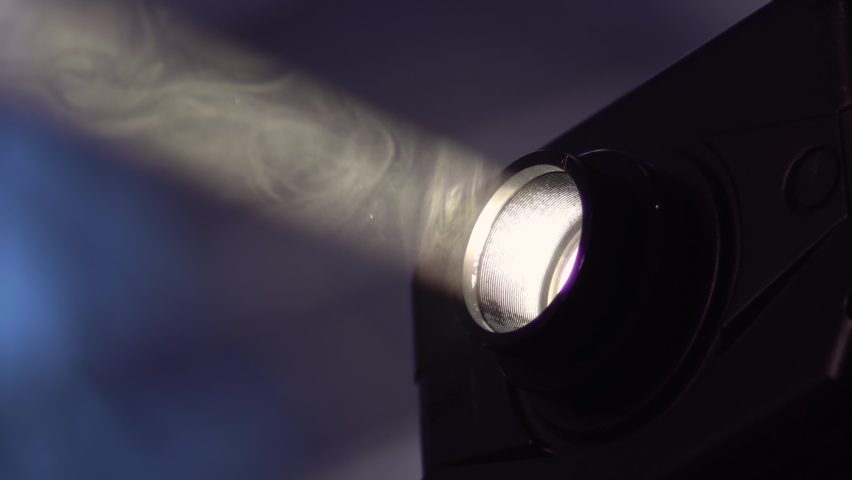Closeup of projector beam light in cinema | Shutterstock HD Video #1065506503