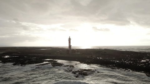 Lighthouse el Toston in el Cotillo aerial drone shot - Fuerteventura island