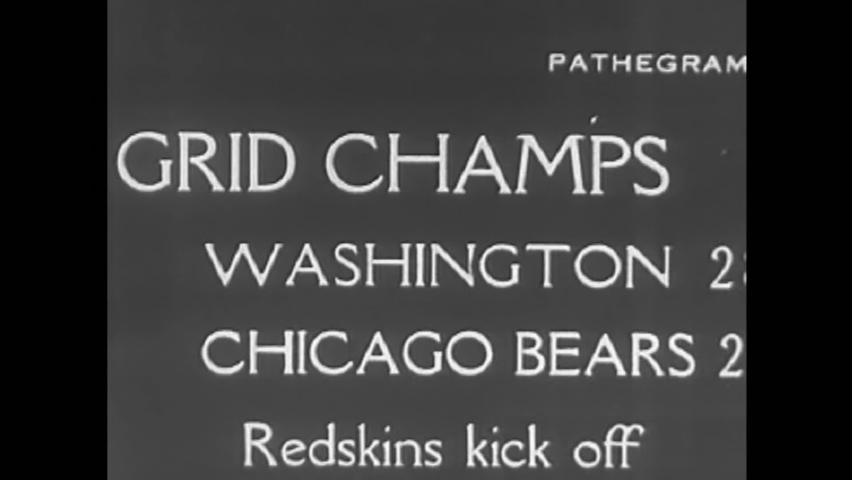 CIRCA 1930s - The Washington Redskins and Chicago Bears compete in the football Grid Championships in 1937. | Shutterstock HD Video #1065567562