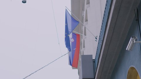 Waving flag of Slovenia and European union