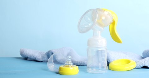Breast pump and towel on table