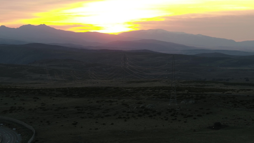 SPANISH SUNSET WITH ELECTRICAL CABLES