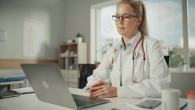 Doctor's Online Medical Consultation: Caucasian Female Physician is Making a Conference Video Call with a Patient on a Laptop Computer. Health Care Professional Giving Advice, Explaining Test Results.