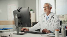 Doctor's Online Medical Consultation: Caucasian Senior Physician is Making a Conference Video Call with a Patient on a Computer. Health Care Professional Giving Advice, Explaining Test Results.