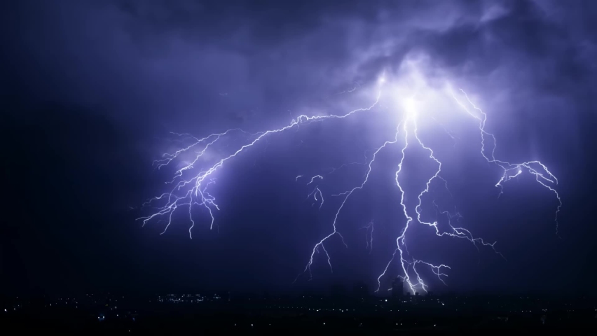 Lightning and thunder over the city at night, glaring and spectacular lightning, thunderstorms Royalty-Free Stock Footage #1065604801
