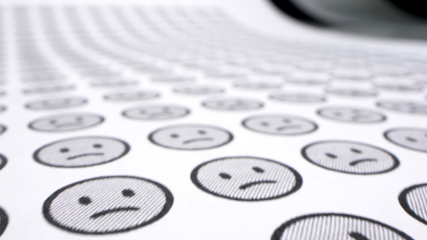 extremely close-up, detailed. smilies background. one cheerful smile among many sad ones.