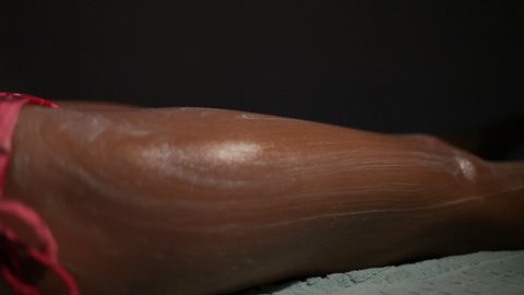 Massage of the beautiful leg in Turkish bath Hamam.close-up.