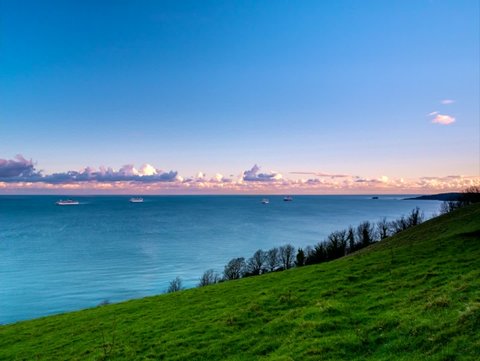 Time Lapse Movie of Cruise ferry during the sunset from Torquay fields in Devon in England in Europe