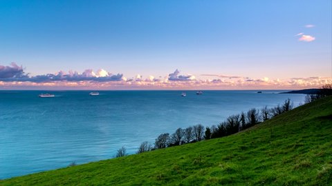 Time Lapse Movie of Cruise ferry during the sunset from Torquay fields in Devon in England in Europe