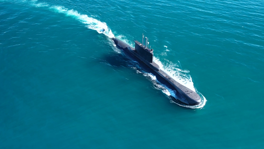 Aerial drone video of latest technology naval armed forces submarine cruising in deep blue open ocean sea | Shutterstock HD Video #1065642646