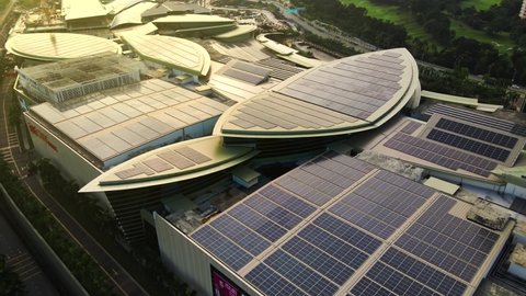 KL, MALAYSIA - JANUARY 16th, 2021 : Aerial cinematic view of a solar panel on IOIcitymall roof top. Part of reduce reuse and restore concept. Clean energy for future tomorrow. 