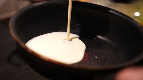 Pancake in frying pan. Making of pancakes. 3-shots
