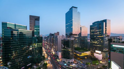 Seoul city Skyling and Skyscraper and Traffic at niaht in Gangnam, South Korea. 4K Timelapse