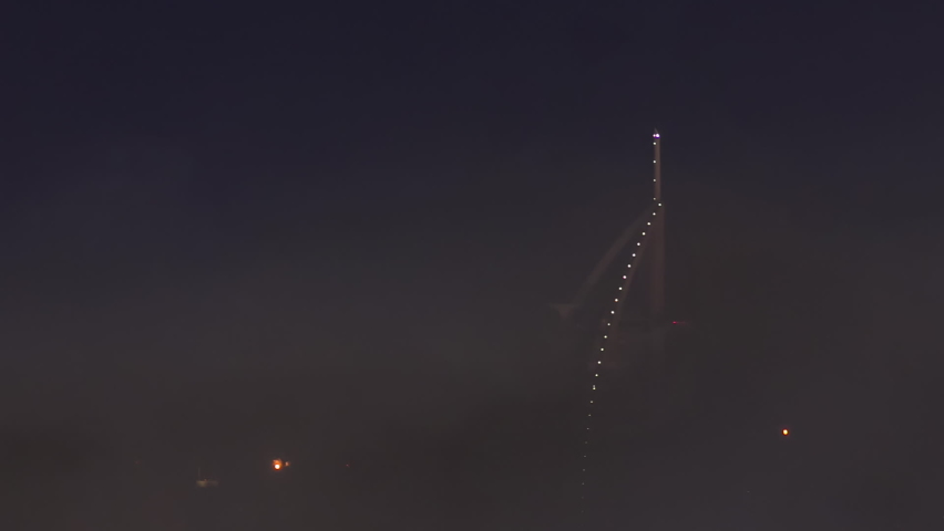 Dubai, new years eve fireworks near burj al arab timelapse top view. Hazy weather. United Arab Emirates