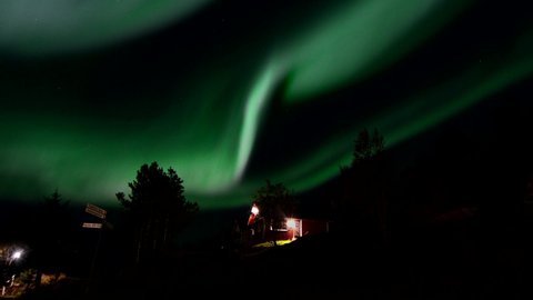 Timelapse of Northern Lights above a Cabin in Skarungn, Aurora Borealis Norway in Lofoten Islands