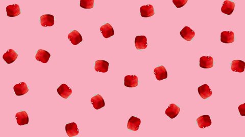 seamless looping animation with many cakes in the shape of a red heart wiggle on a pink background. valentine's day concept
