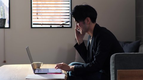 Japanese businessman doing remote work at home