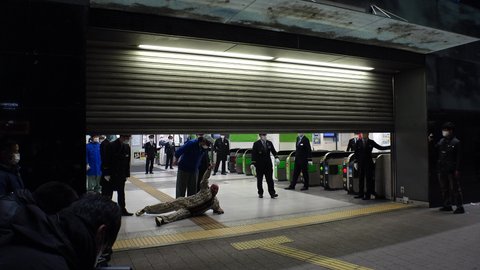 SHIBUYA, TOKYO, JAPAN -  31 DEC 2020 to 1 JAN 2021 : Shibuya cancels New Year’s Eve countdown event due to Coronavirus (COVID-19). View of just before last train leaving from JR Shibuya Station.