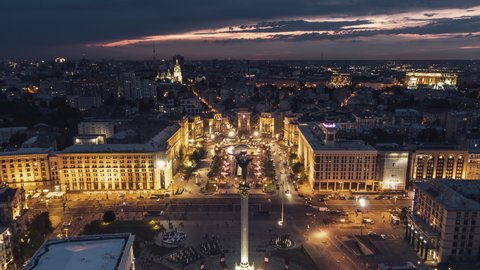 Establishing Aerial View Shot of Kyiv Kiev, Independence Square, Maidan Nezalezhnosti, Ukraine, at evening night, track in