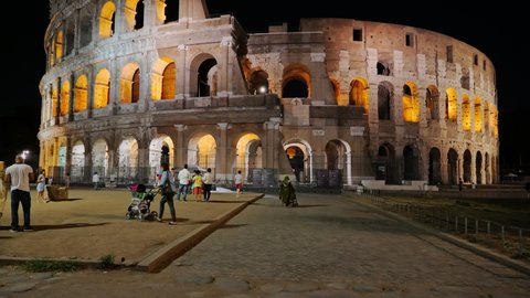 Rome, Italy - Circa September, 2020: Colosseum at night, ancient Flavian Amphitheatre and gladiators arena, famous city landmark