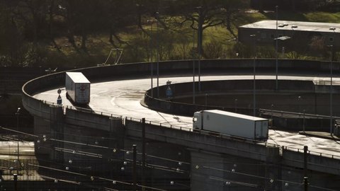 Two lorries turning at the near empty Channel Tunnel, Folkestone, Kent, UK - 01 17 2021