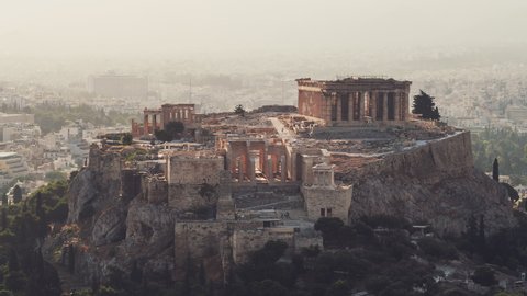 Establishing Aerial View Shot of Athens, Parthenon, circling around Acropolis, Greece