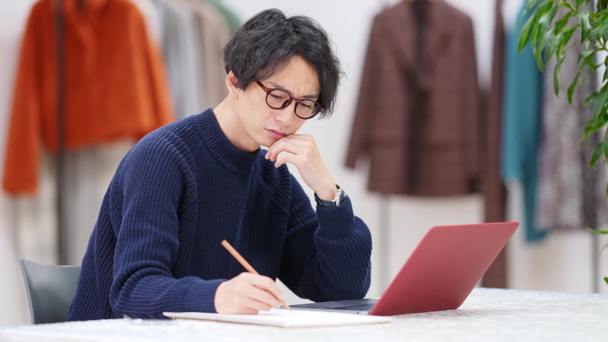 Depressed young asian man in office. | Shutterstock HD Video #1065728284