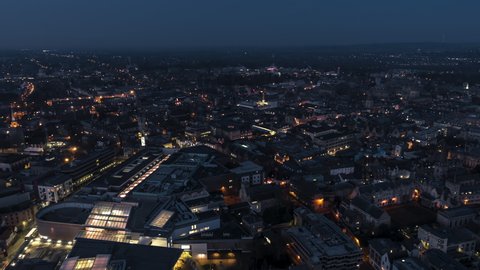 Establishing Aerial View Shot of Oxford UK, shopping center and old town, United Kingdom at night evening