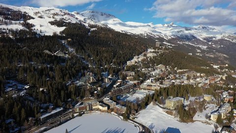 Aerial footage of the famous Crans-Montana ski resort in Canton Valais in the alps in Switzerland, shot on a sunny winter day